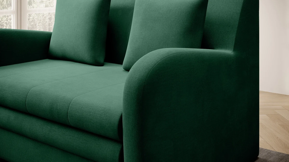 sofa-ario-zielona-gladka-detal-lewy-podlokietnik-i-siedzisko-zblizenie.webp