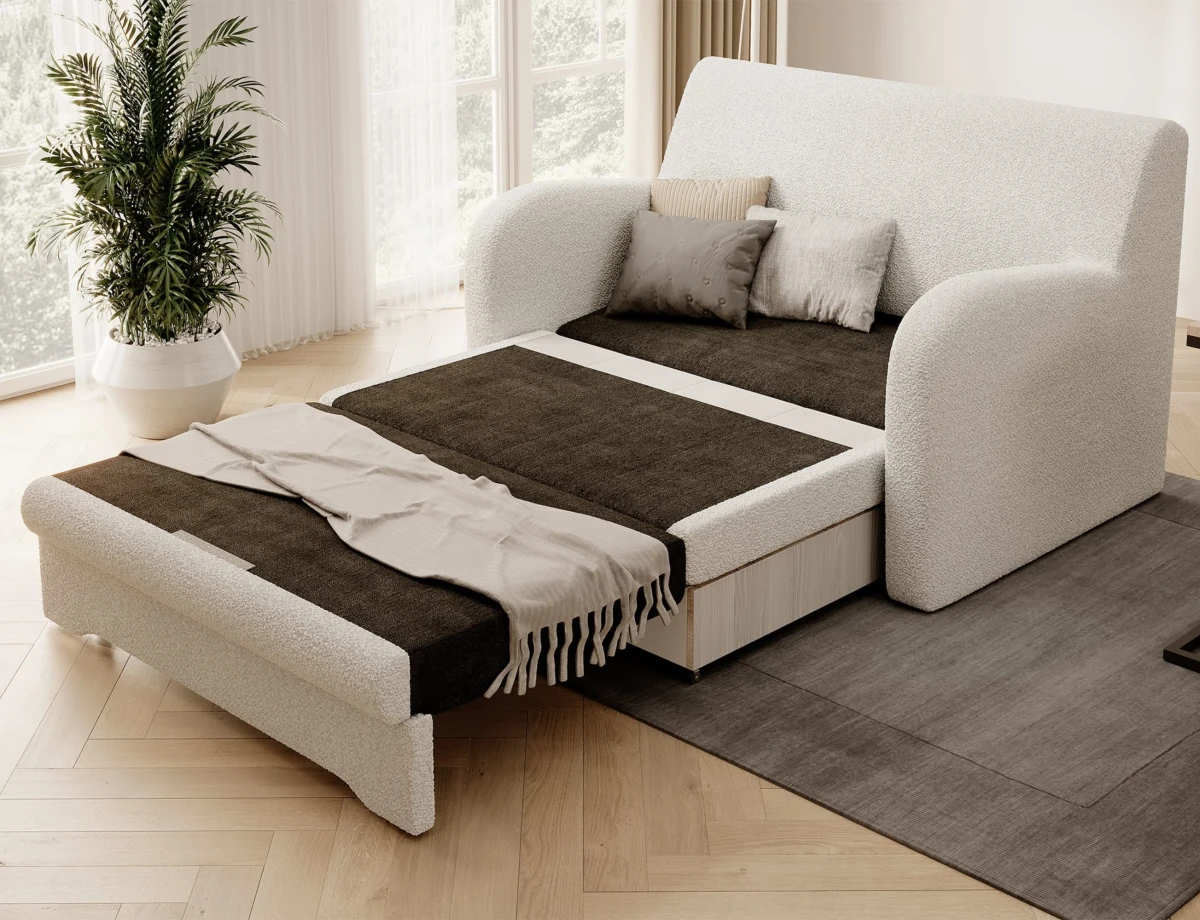 sofa-royal-biala-boucle-funkcja-spania-rozlozona-skos-aranzacja-salon.webp
