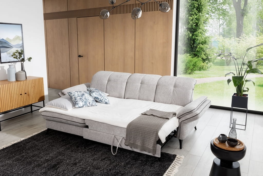 Zdjęcie Prezentujące Rozłożoną Funkcję Spania w Narożniku MASIMO 242 - 270 cm w Salonie